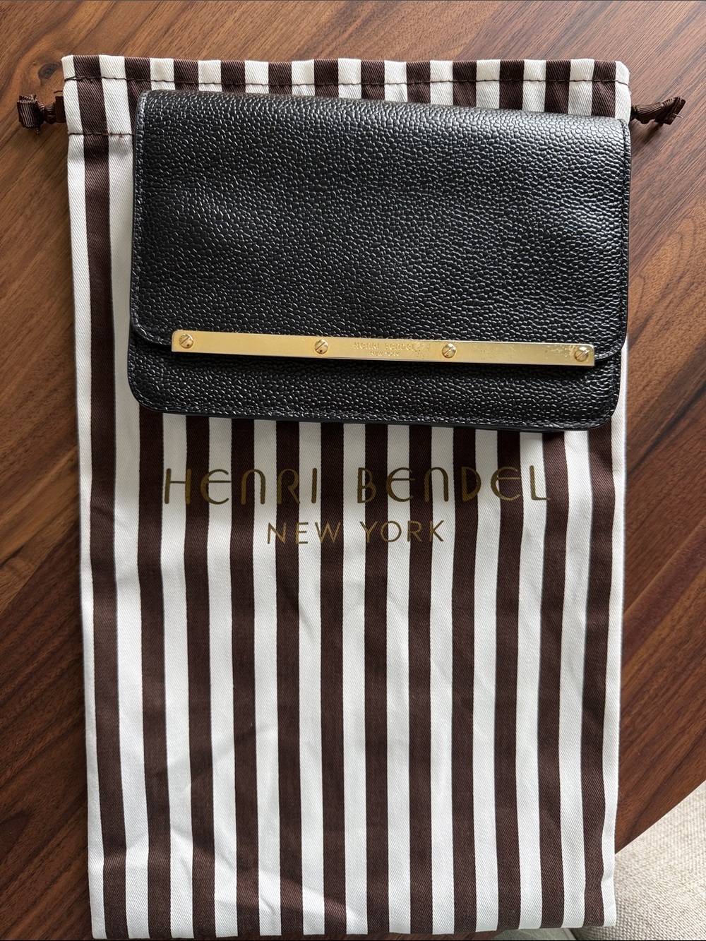Henri Bendel Black Leather Clutch with Gold Bar Accent gold change vintage